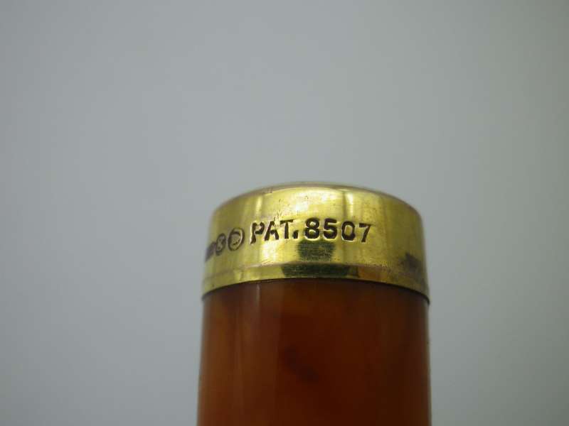 Antique Hallmarked 9ct gold rimmed  Amber Cigarette Holder. London