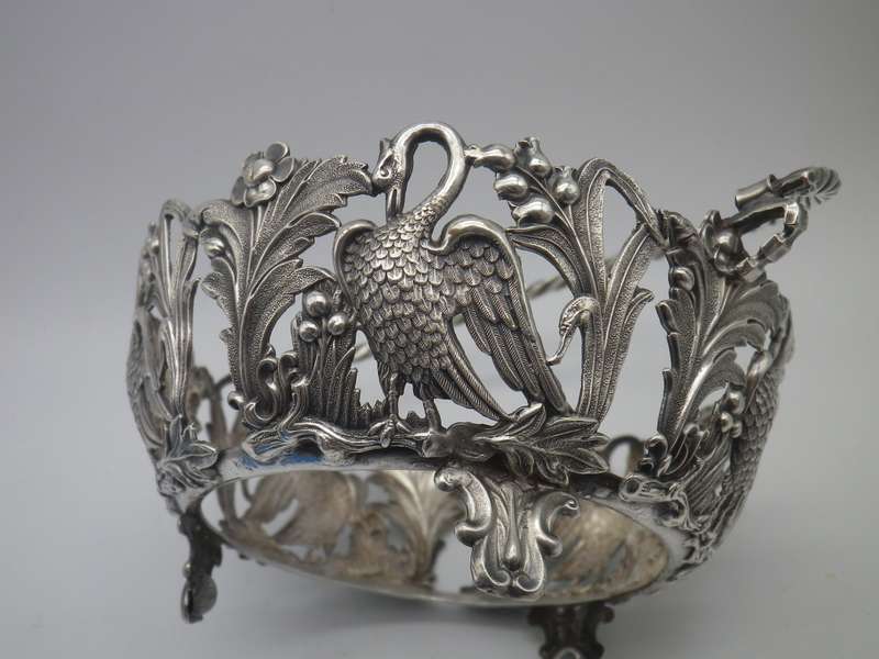 VICTORIAN C1890S SILVER PLATE (or low grade silver?)  ORNATE CRANE BASKET WITH BLUE GLASS LINER.
