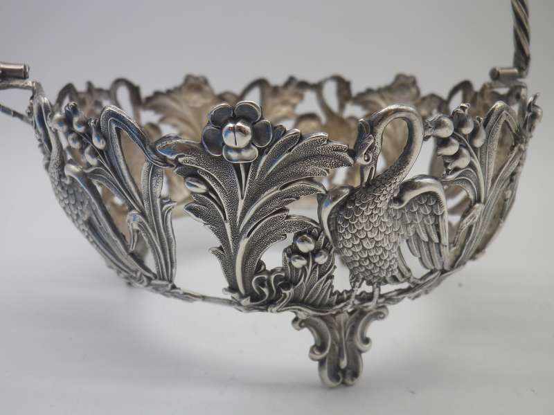 VICTORIAN C1890S SILVER PLATE (or low grade silver?)  ORNATE CRANE BASKET WITH BLUE GLASS LINER.