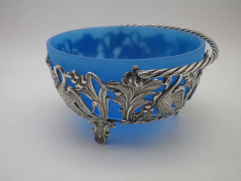 VICTORIAN C1890S SILVER PLATE (or low grade silver?)  ORNATE CRANE BASKET WITH BLUE GLASS LINER.