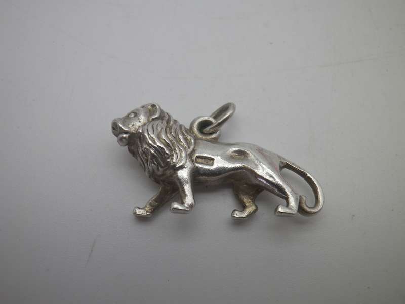 Sterling Silver LION pendant.. Good quality. Heavy 6g. 2.8cm long