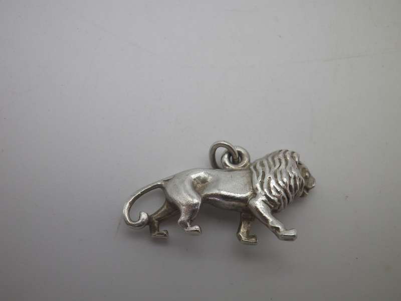 Sterling Silver LION pendant.. Good quality. Heavy 6g. 2.8cm long