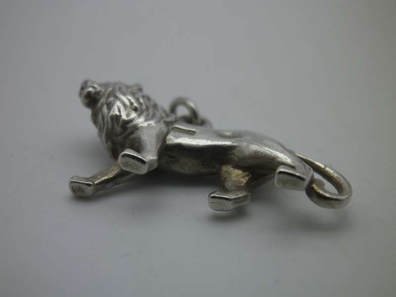 Sterling Silver LION pendant.. Good quality. Heavy 6g. 2.8cm long