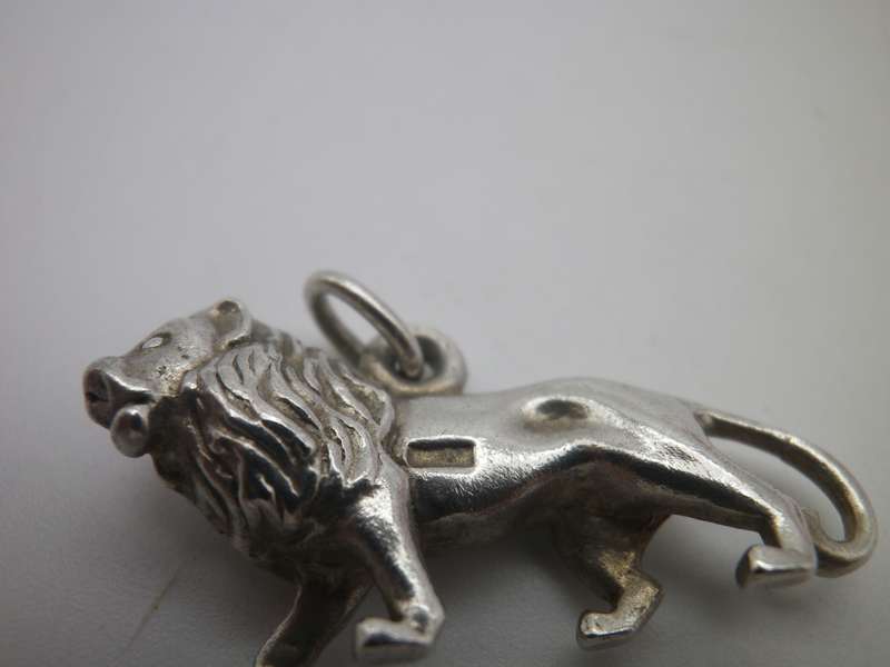 Sterling Silver LION pendant.. Good quality. Heavy 6g. 2.8cm long