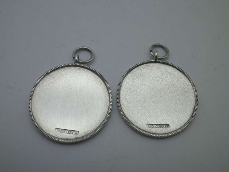 Two Vintage Sterling Silver Round Medal pendants. 9.3g 2.9cm