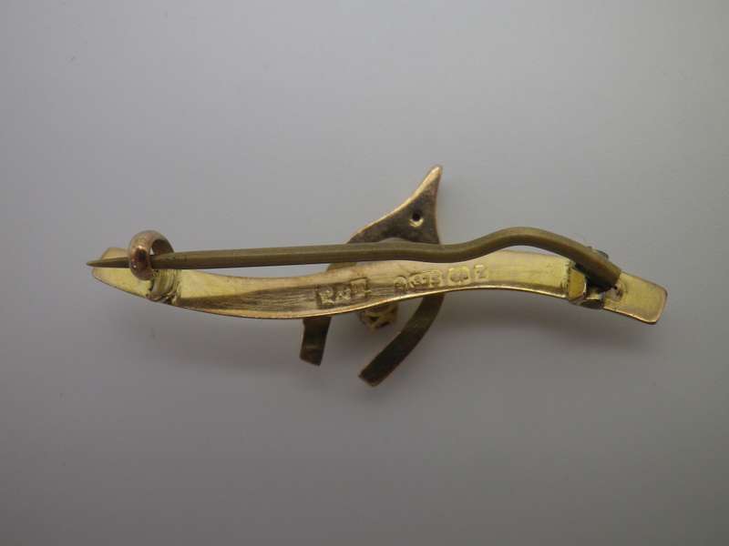 FOR DILA ONLY PLEASE. Hallmarked 9ct Gold & Ruby Lucky Wishbone brooch. Birmingham. 4cm 1.3g