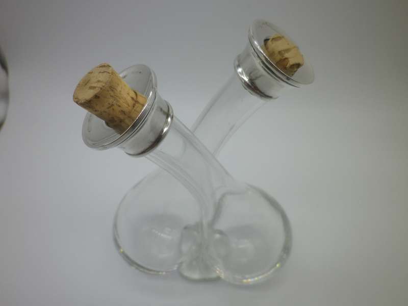 Vintage Glass Oil & Vinegar twist neck holder. Hallmarked silver tops. London 1929  W & Co. 16 cm