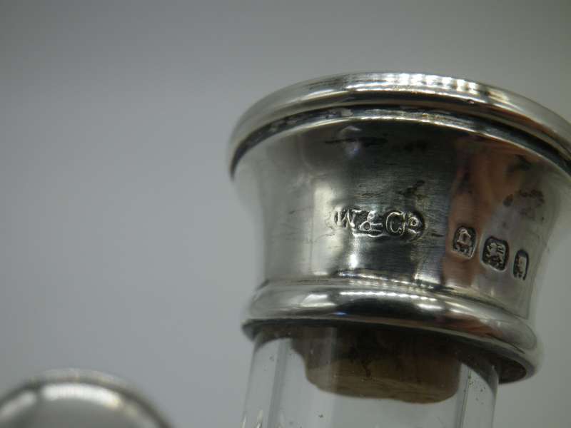 Vintage Glass Oil & Vinegar twist neck holder. Hallmarked silver tops. London 1929  W & Co. 16 cm