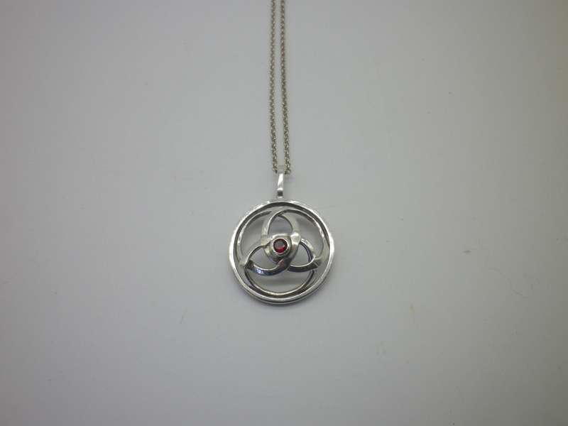 Vintage Sterling Silver CELTIC KNOT PENDANT with a little red stone, on silver Chain