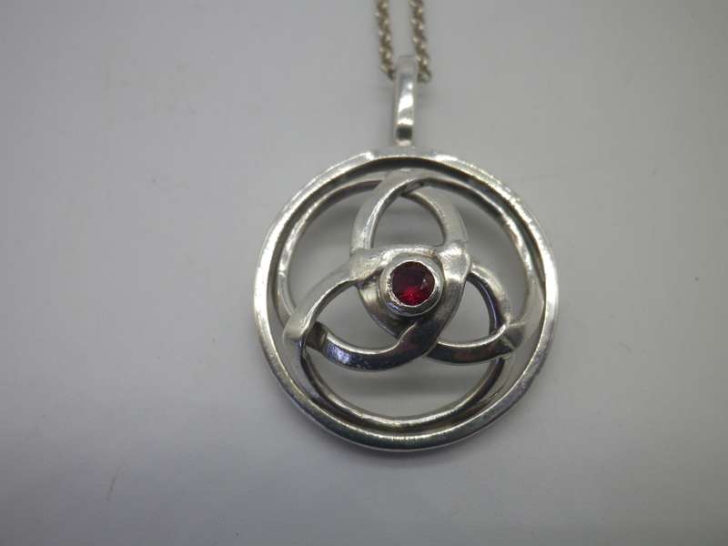 Vintage Sterling Silver CELTIC KNOT PENDANT with a little red stone, on silver Chain