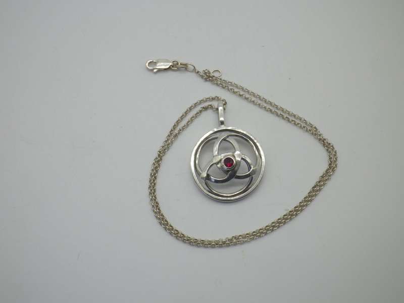 Vintage Sterling Silver CELTIC KNOT PENDANT with a little red stone, on silver Chain