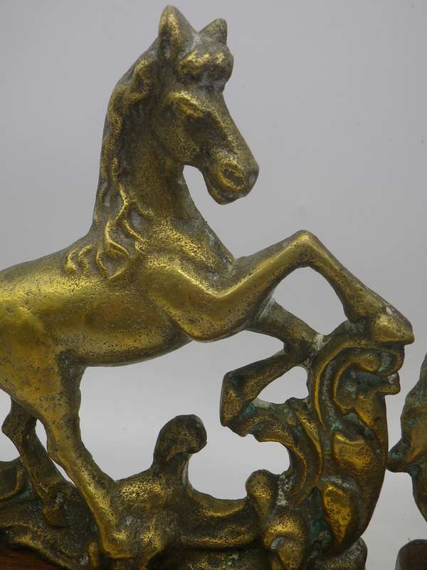 Pair Solid Cast brass Horse bookends on wooden bases. 17.cm x 15cm long