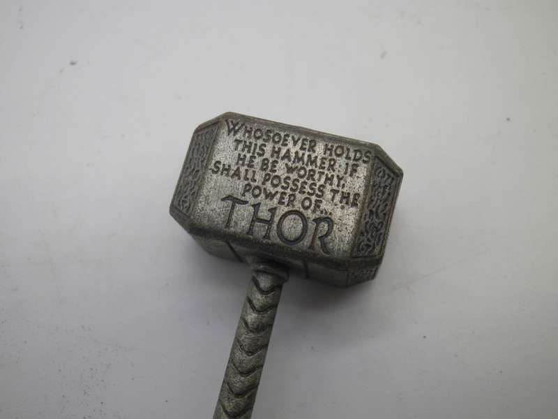 Cool THOR'S Hammer pendant. copyright MARVEL. Silver color metal on material thong.