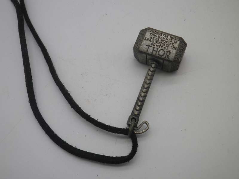 Cool THOR'S Hammer pendant. copyright MARVEL. Silver color metal on material thong.