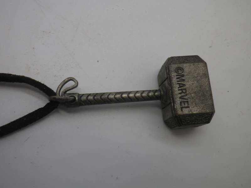 Cool THOR'S Hammer pendant. copyright MARVEL. Silver color metal on material thong.