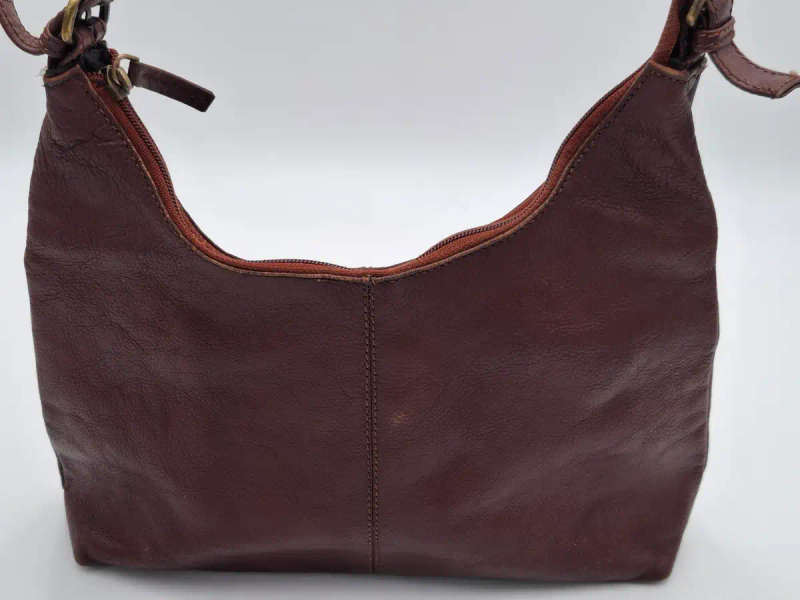 Vintage Burgundy Brown Busby Leather Sling Bag. Good Condition.
