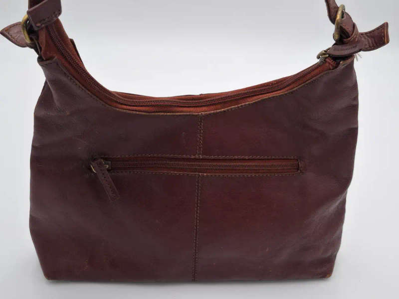 Vintage Burgundy Brown Busby Leather Sling Bag. Good Condition.