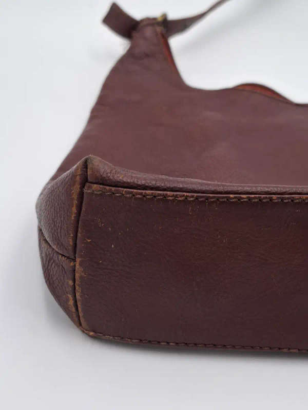 Vintage Burgundy Brown Busby Leather Sling Bag. Good Condition.