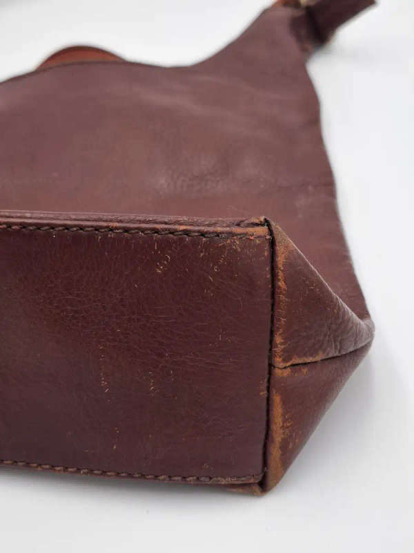Vintage Burgundy Brown Busby Leather Sling Bag. Good Condition.