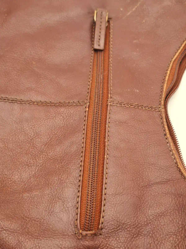 Vintage Burgundy Brown Busby Leather Sling Bag. Good Condition.