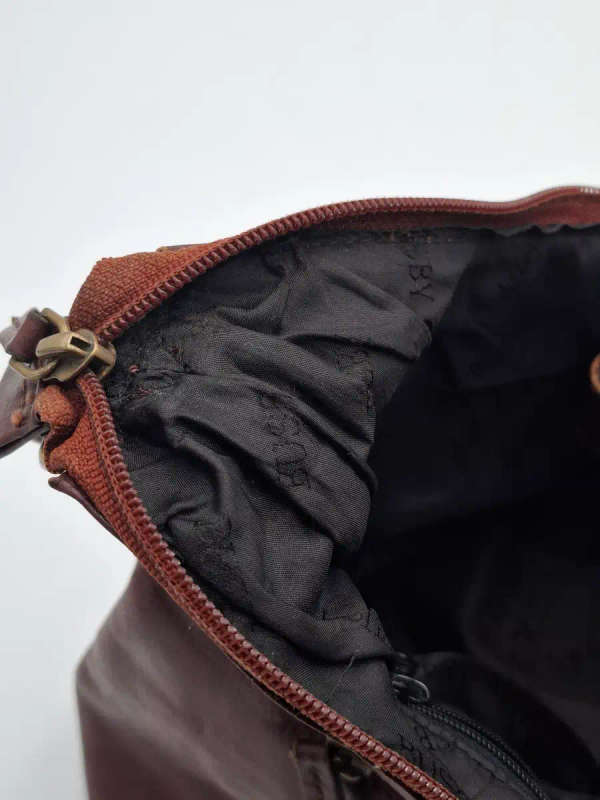 Vintage Burgundy Brown Busby Leather Sling Bag. Good Condition.