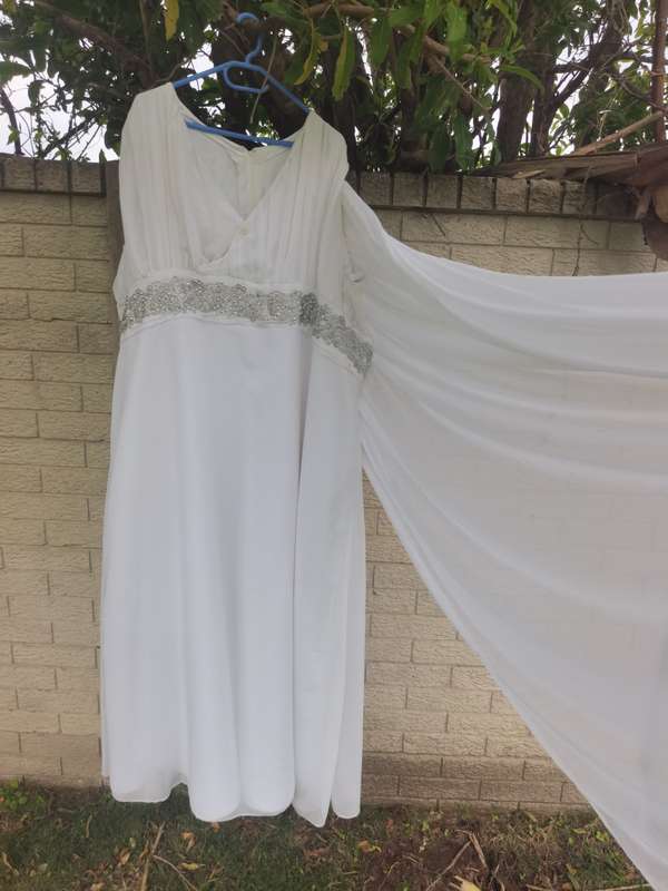 plus size wedding dress with long back veil