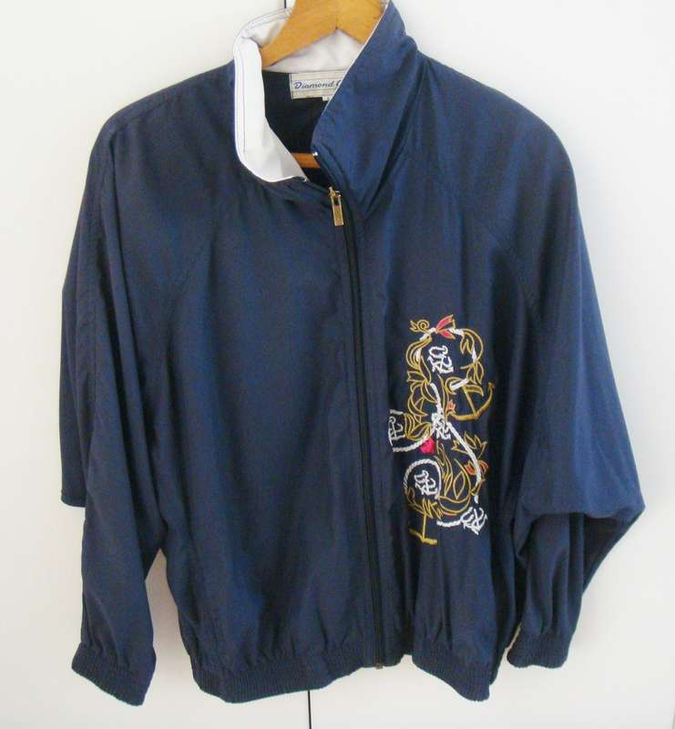 Ladies  Jacket  -   Size  medium -   Navy with embroyed right side