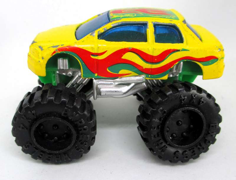 Vintage 1:64 Mitsubishi Lancer Evo VII Monster Truck Suntoys  Truck / 1998 / Yellow With Flames