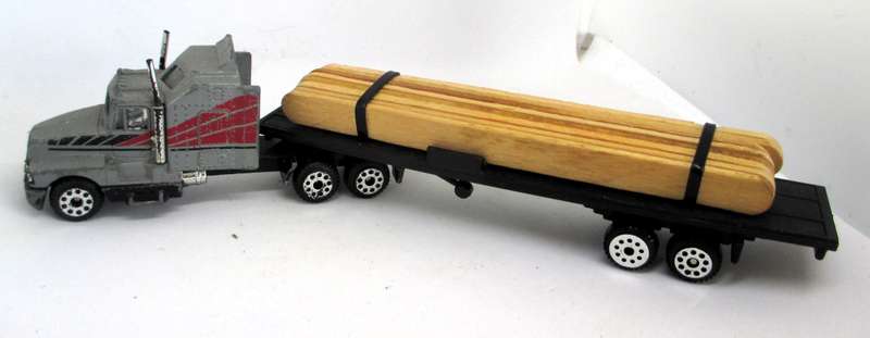 K6 Kenwoth T660A Truck with trailer and load.