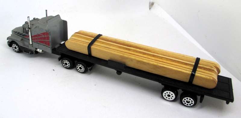 K6 Kenwoth T660A Truck with trailer and load.