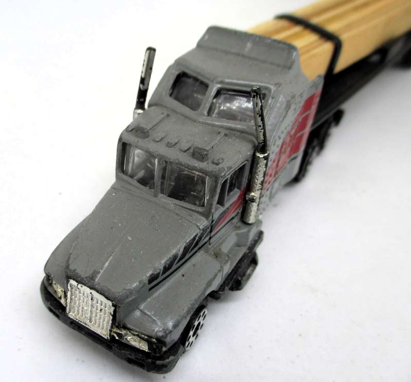K6 Kenwoth T660A Truck with trailer and load.