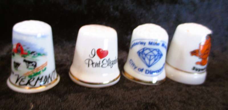 Lot of 4 Vintage Fine China Porcelain Thimbles from places in South Africa, as per photo. 30mm high