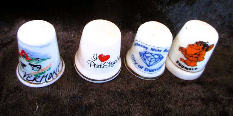 Lot of 4 Vintage Fine China Porcelain Thimbles from places in South Africa, as per photo. 30mm high
