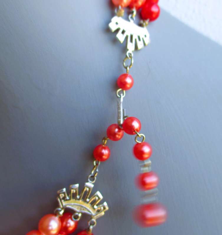 Vintage Tripple string Coral color bead necklace. 400mm .