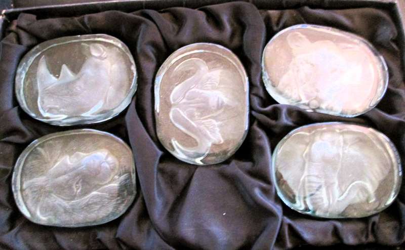 Set of Big Five Heavy Glass Paper weights, in box. Total weight 1770g.