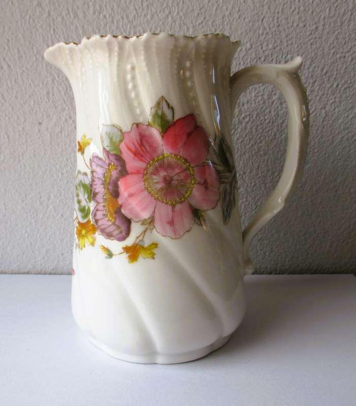 Lovely Vintage fine Porcelain handpainted, Large Pitcher. Small hairline crack, not visible outside