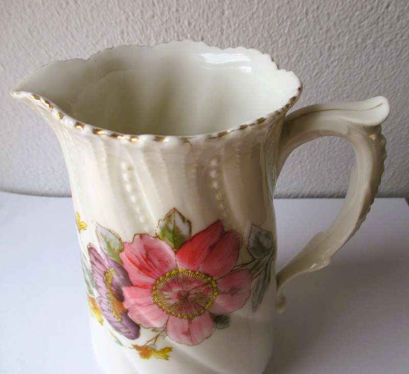 Lovely Vintage fine Porcelain handpainted, Large Pitcher. Small hairline crack, not visible outside