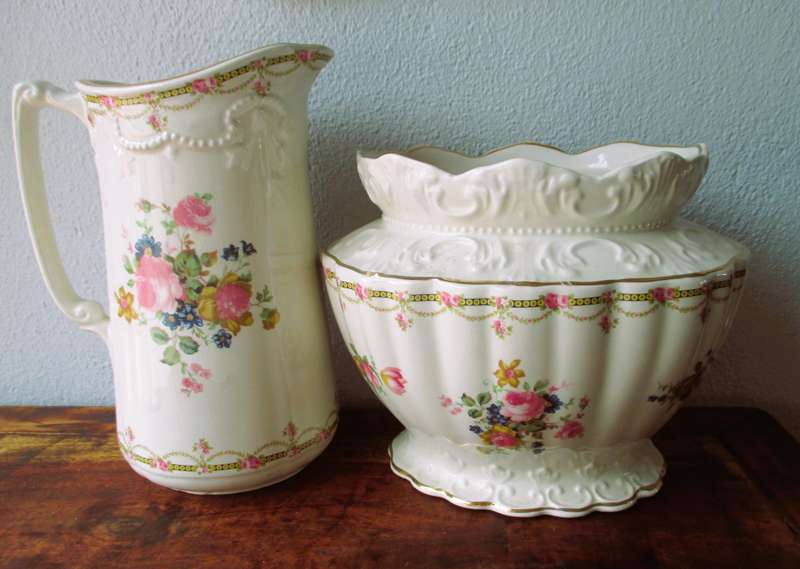 Vintage style Decorative Cream floral Vase and Pitcher. Lovely item.