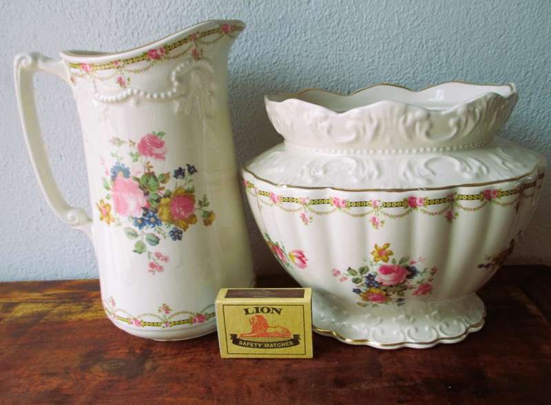 Vintage style Decorative Cream floral Vase and Pitcher. Lovely item.
