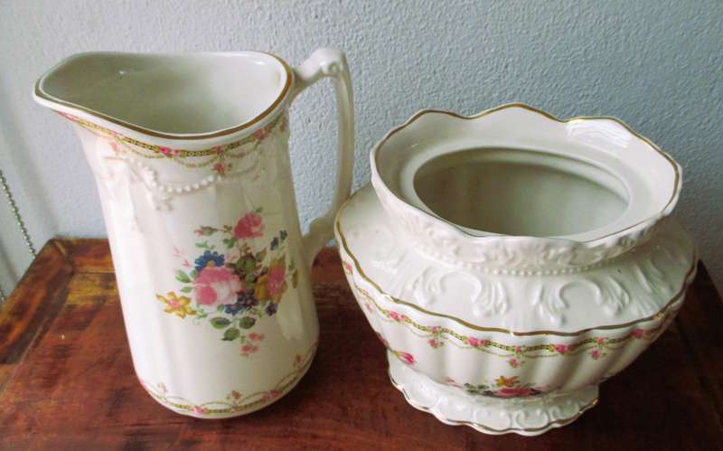 Vintage style Decorative Cream floral Vase and Pitcher. Lovely item.
