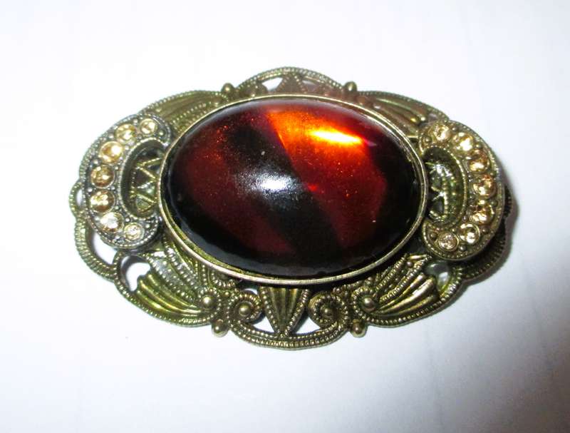 Vintage Oval Brooch with Bronze color Filigree and Rhinestones, with Amber color Stone Centre. 50mm.
