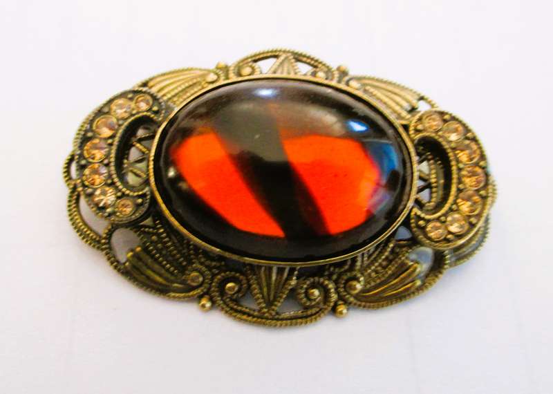 Vintage Oval Brooch with Bronze color Filigree and Rhinestones, with Amber color Stone Centre. 50mm.