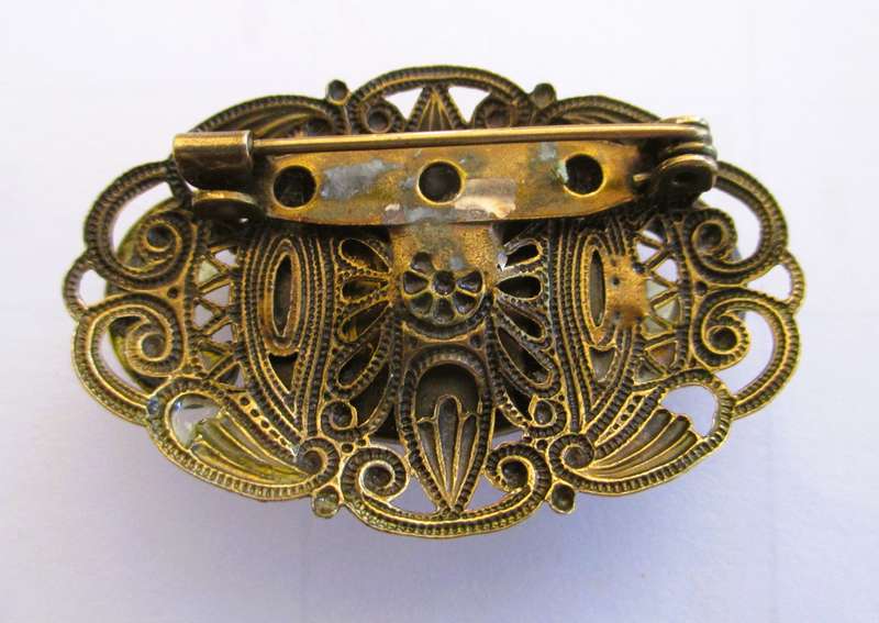 Vintage Oval Brooch with Bronze color Filigree and Rhinestones, with Amber color Stone Centre. 50mm.