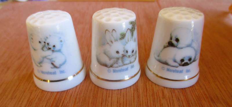 Set of  White Porcelain Thimbles - Arctic Animals. Morehead Inc.