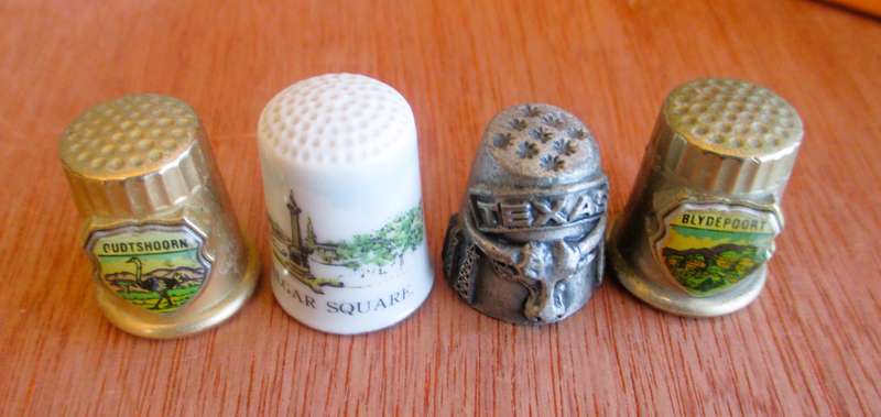 Lot of 4 Thimbles, as per photo.