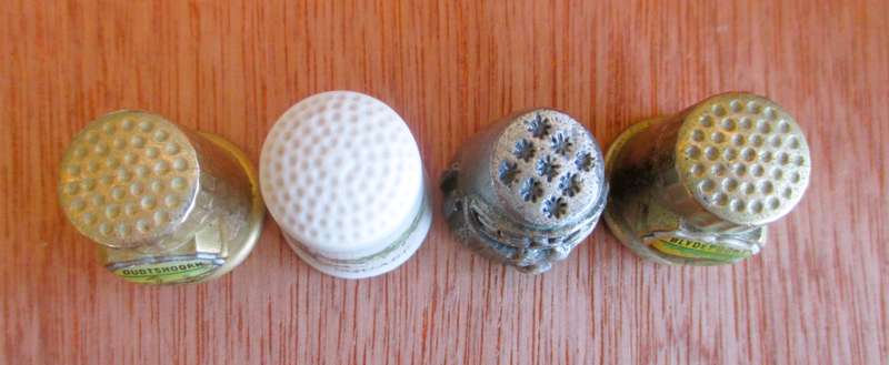 Lot of 4 Thimbles, as per photo.