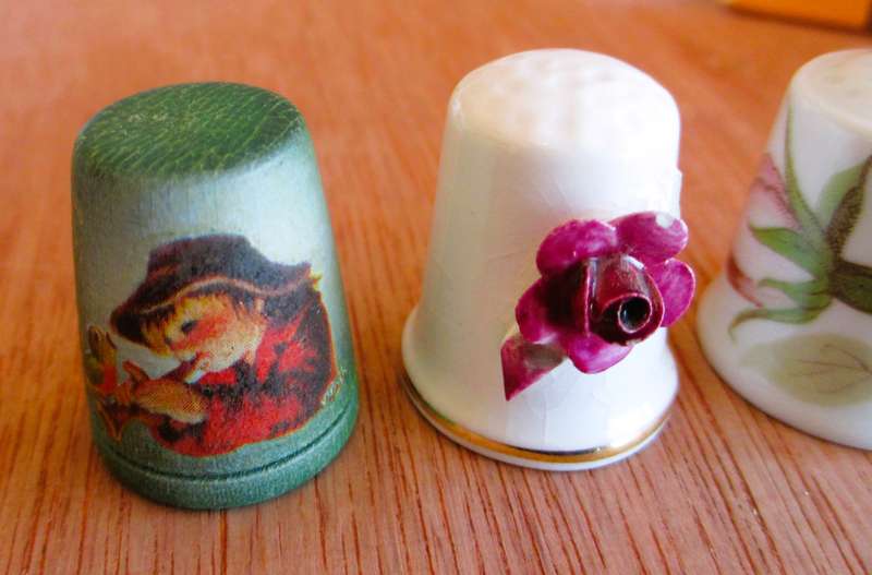 Lot of 3 Thimbles, 2 Ceramic with flowers, 1 wooden from Italy, Anri 1981.