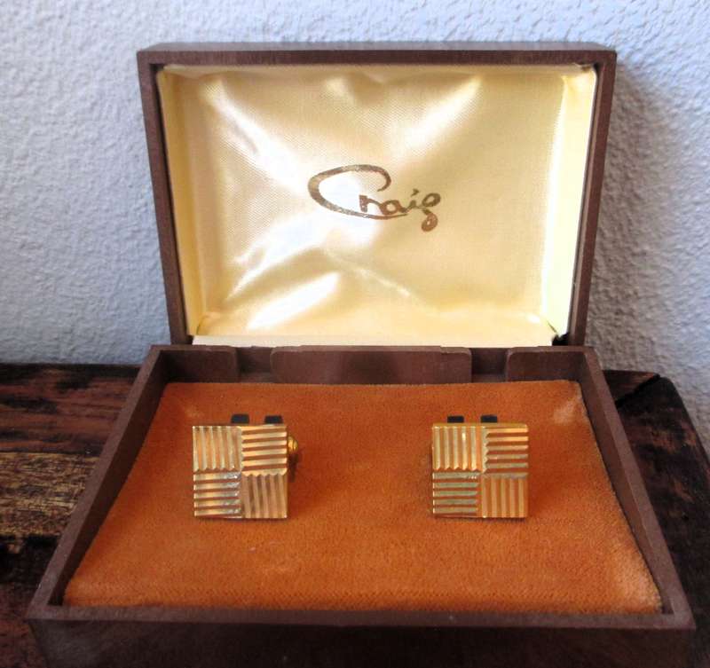 Vintage gold color cufflinks in box.