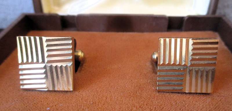 Vintage gold color cufflinks in box.