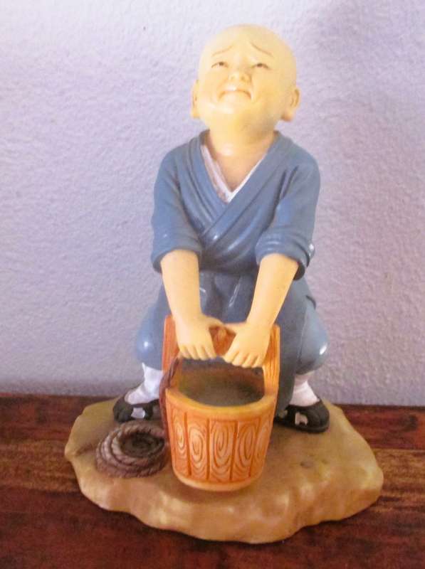 Vintage Shaolin Baby Monk Resin Figurene carring a bucket. Very Collectable. 140x100mm